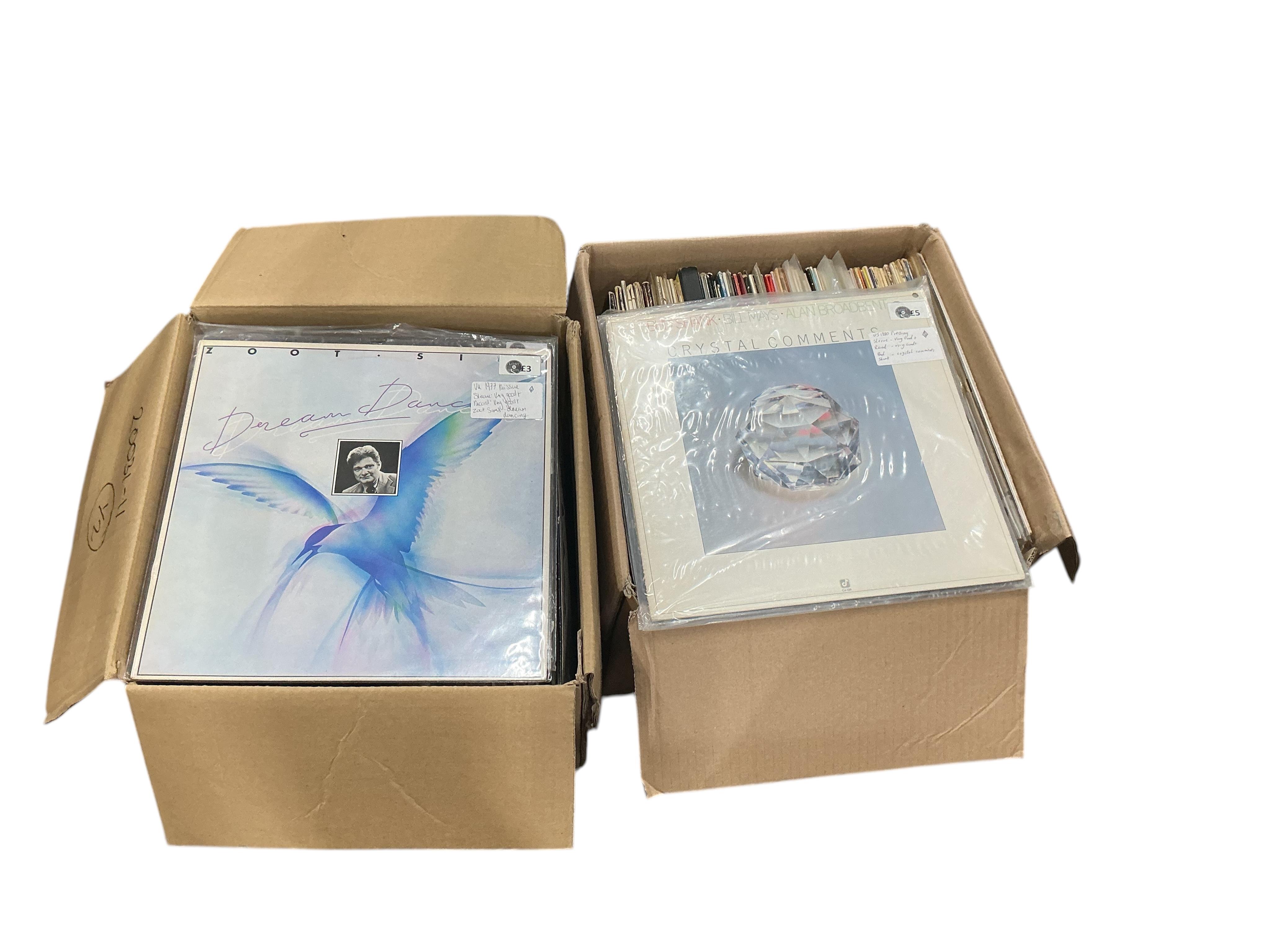 Two boxes of jazz LP record albums, artists including; Herbie Mann, Bill Evans, Ray Charles, Jerry Mulligan, Jelly Roll Morton, Art Farmer, Jimmy Smith, Frank Rosolino, Spike Robinson, Bud Shank, etc.